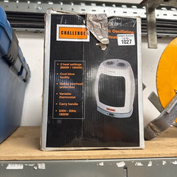 Used Challenge 2kw fan heater with plastic casing and carry handle.
