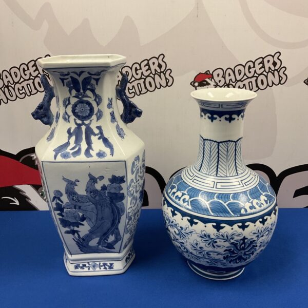 Tall Chinese blue and white porcelain vase with phoenix design.