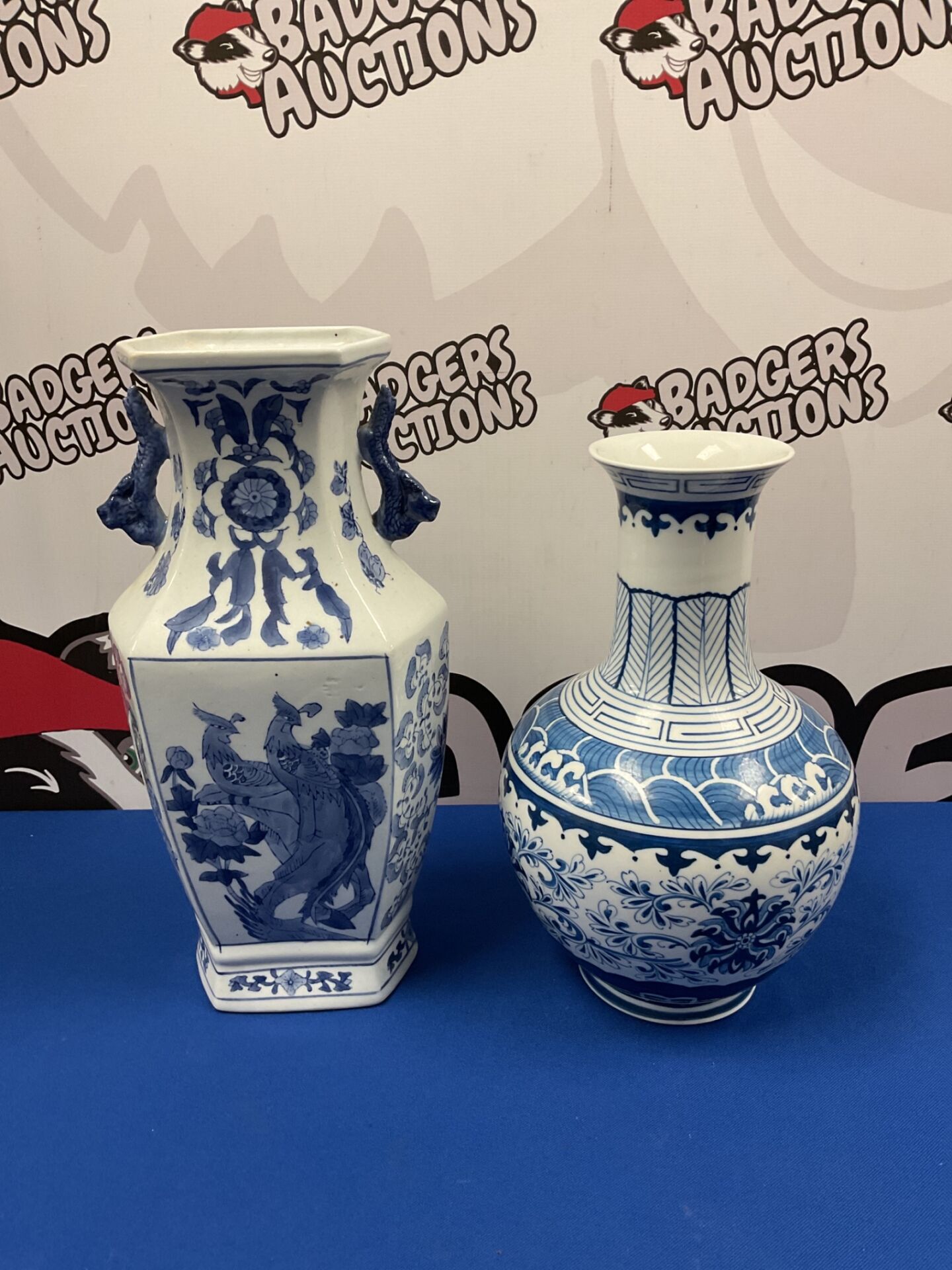 031 Two blue & white Chinese porcelain vases, one featuring phoenix pattern