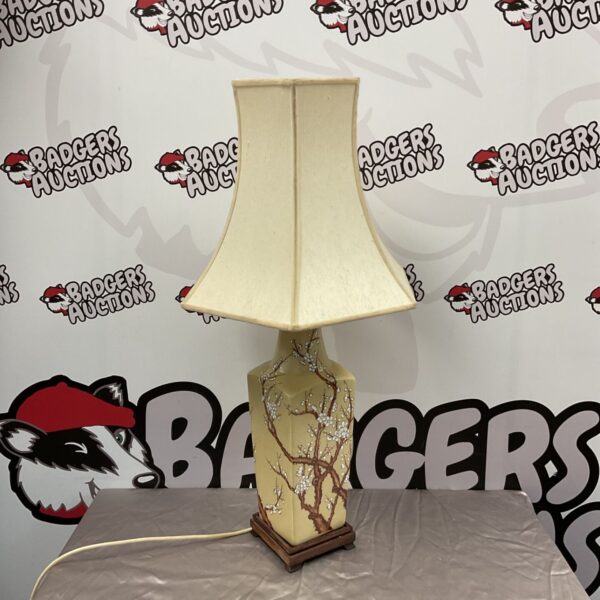 Vintage Chinese ceramic table lamp with delicate blossom tree design.