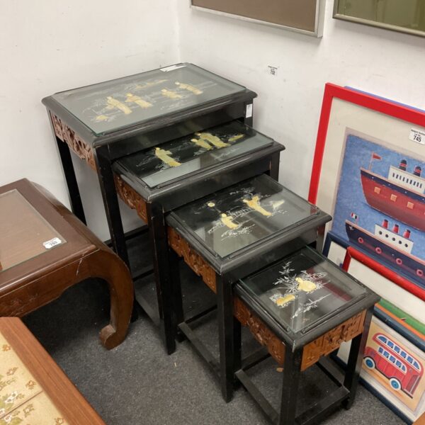 Antique Chinese lacquered tables with mother of pearl inlay in a nest.