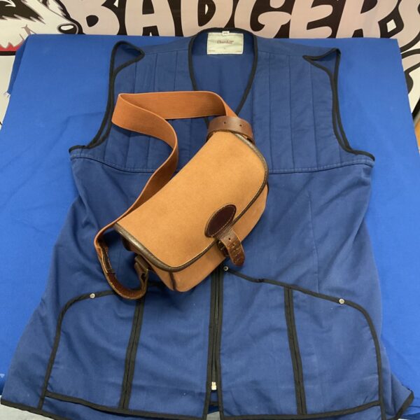 Churchill shooting waistcoat and cartridge bag for game shooting.