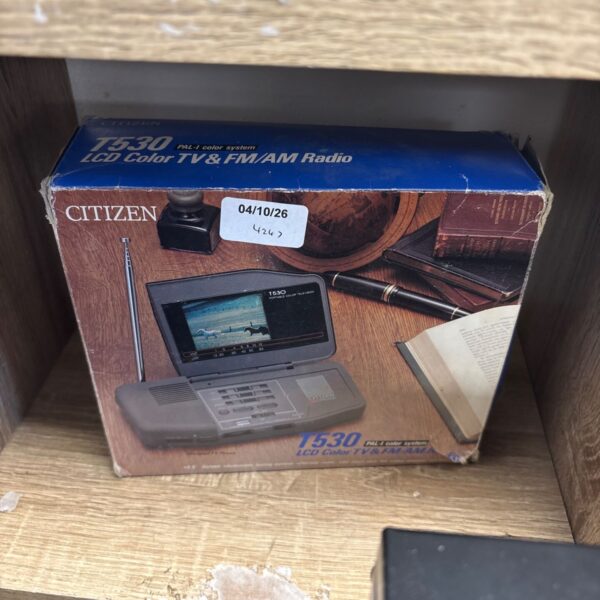 Vintage Citizen T530 LCD TV radio in its original box.