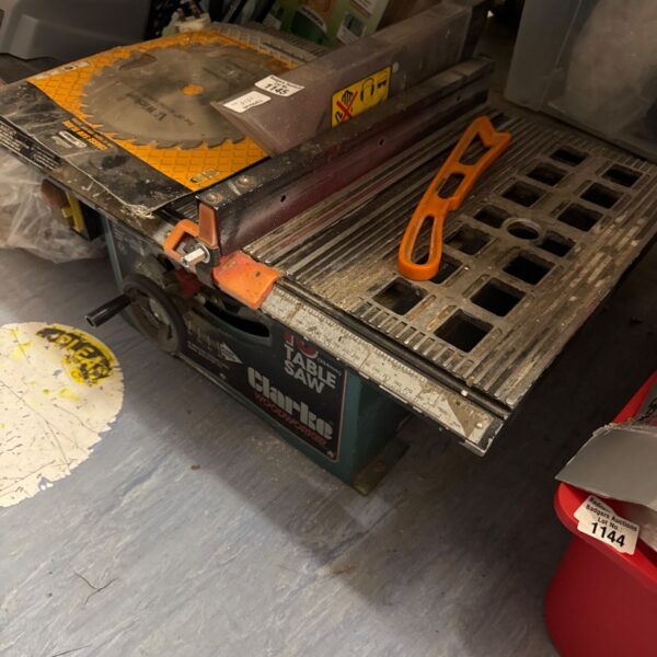 Clarke 10 inch table saw with spare blade, used condition.