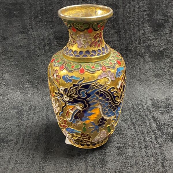 Antique cloisonne vase with a detailed dragon design.