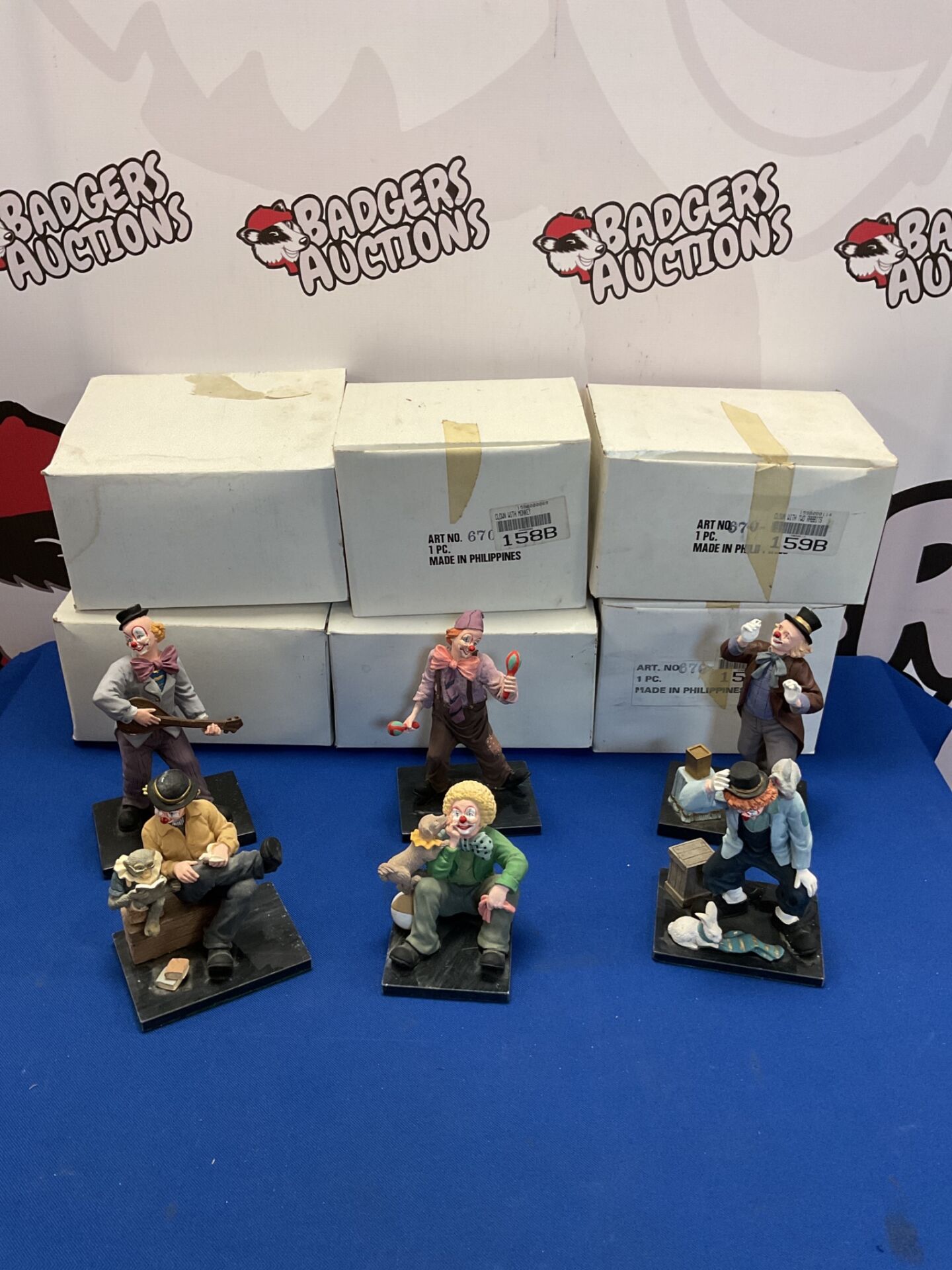 099 Collection of six collectable clown figurines