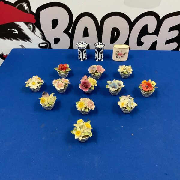 Vintage Coalport china floral ornaments displayed on a surface.