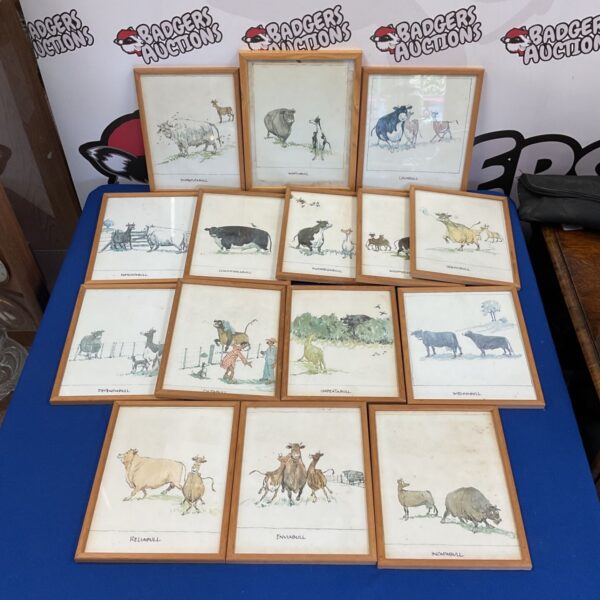 Collection of vintage comical bull and cow prints for farmhouse decor.
