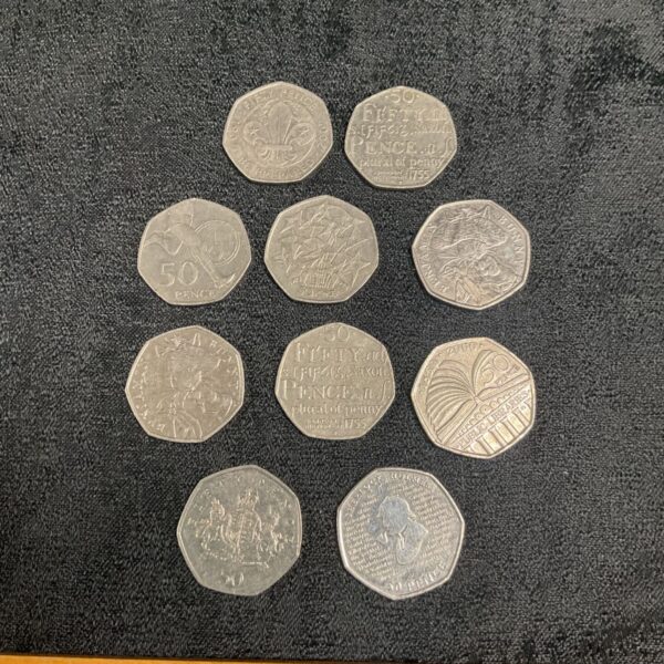 Collection of ten commemorative 50p coins, including Benjamin Bunny.