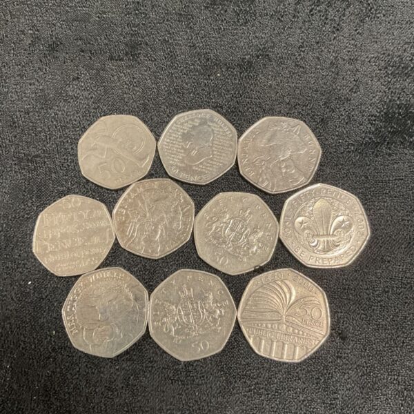Lot of ten commemorative 50p coins, including Sherlock Holmes and Roger Bannister.