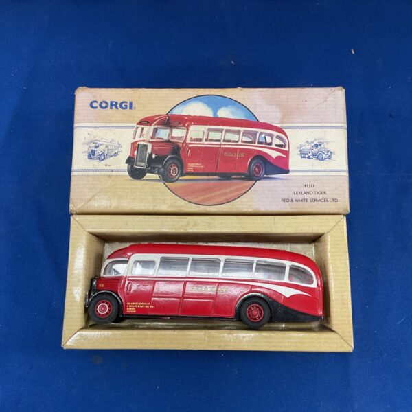 Vintage Corgi Leyland Tiger Red and White bus model.