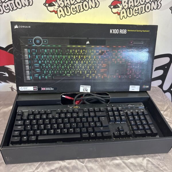 Corsair K100 RGB mechanical gaming keyboard with illuminated keys.