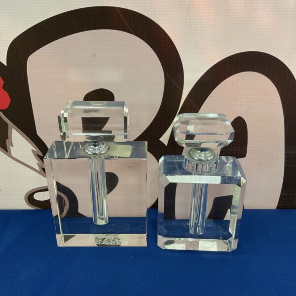 Clear crystal scent bottles, vintage perfume accessories.