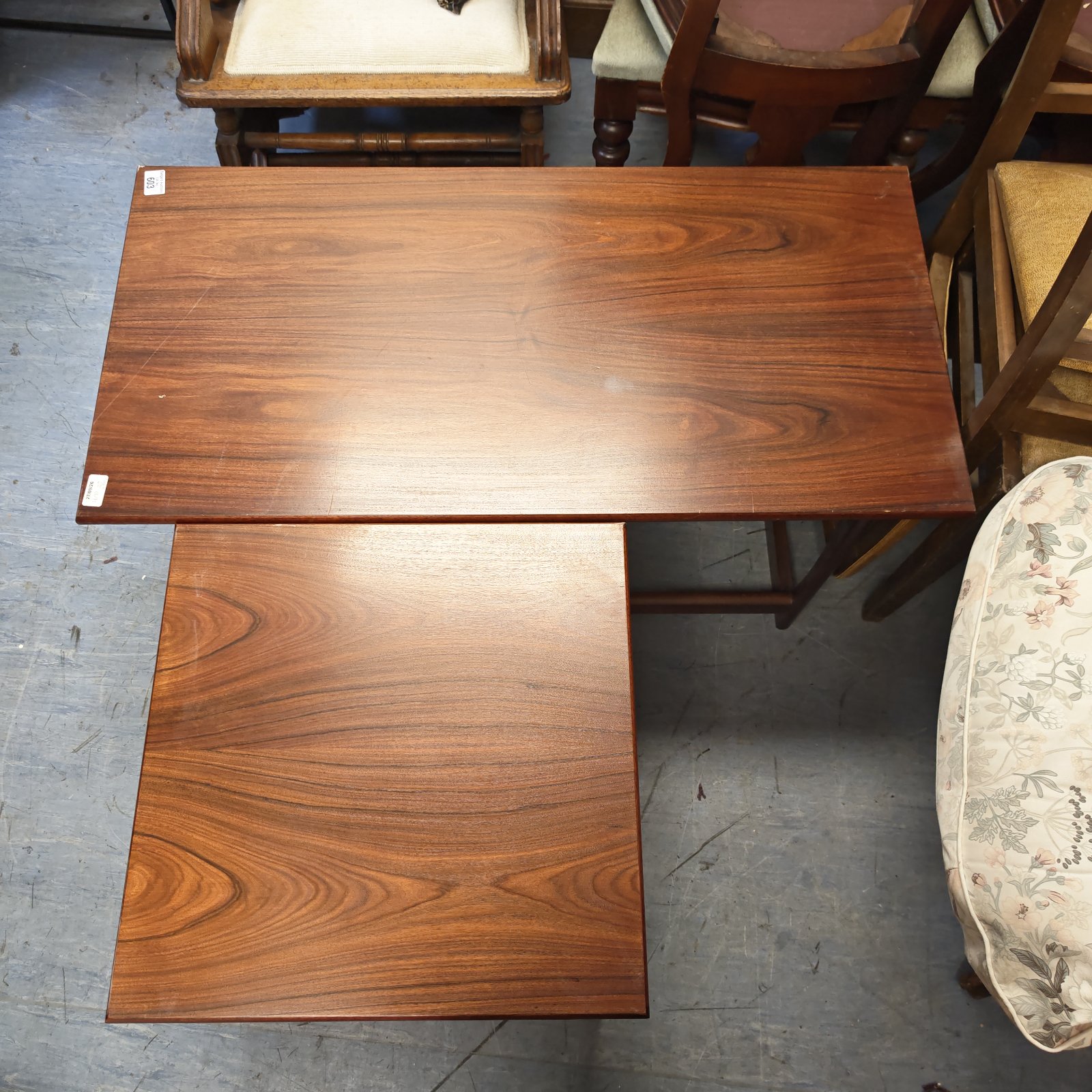 Vintage dark wood nesting coffee tables set for living room.