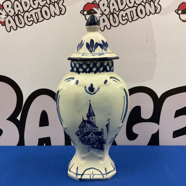 Hand-painted Delft blue lidded jar with building scene.