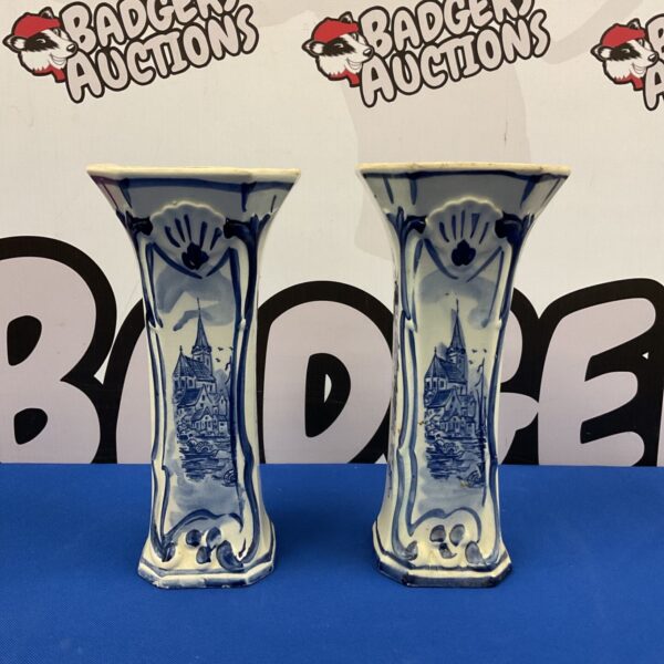 Pair of vintage Delft blue vases with townscape scene.