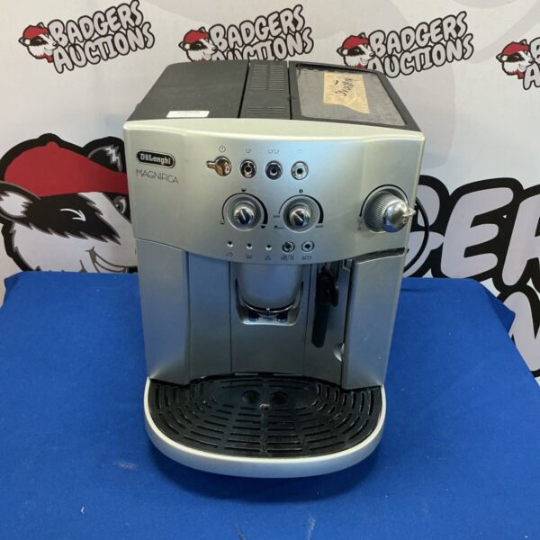 DeLonghi Magnifica coffee machine, a silver automatic espresso maker.