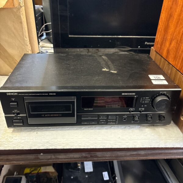 Vintage Denon DRM-555 cassette deck, black stereo component.