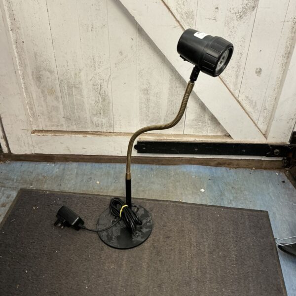 Vintage bendable desk lamp with flexible gooseneck.