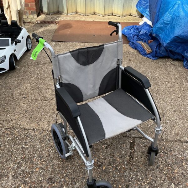 Used DeVilBiss Healthcare folding wheelchair for mobility assistance.