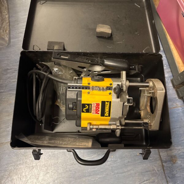 Vintage Dewalt DW625E router in its original carrying case.