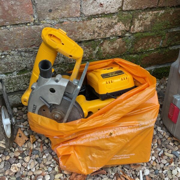 Dewalt cordless power tool set with saws and charger.