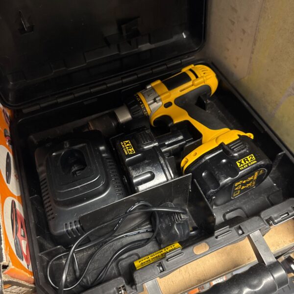 Dewalt XR2 cordless drill set with charger and battery.