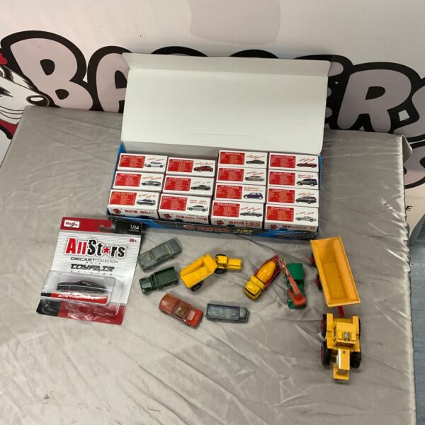 Assorted diecast model cars including Maisto Allstars and Matchbox.
