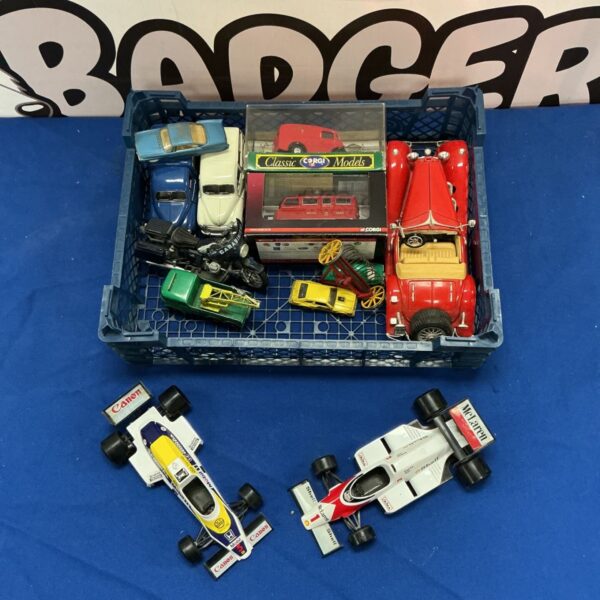 Tray of assorted diecast model cars including F1 cars.