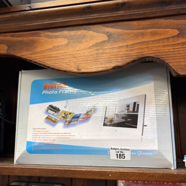 Front view of a used digital photo frame with a screen.
