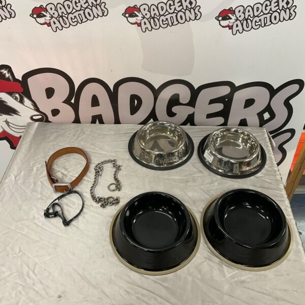 Stainless steel dog bowls and collars in a pet supplies lot.