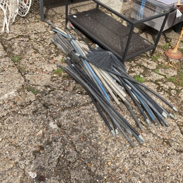 Set of used drain rods for plumbing and drain cleaning.