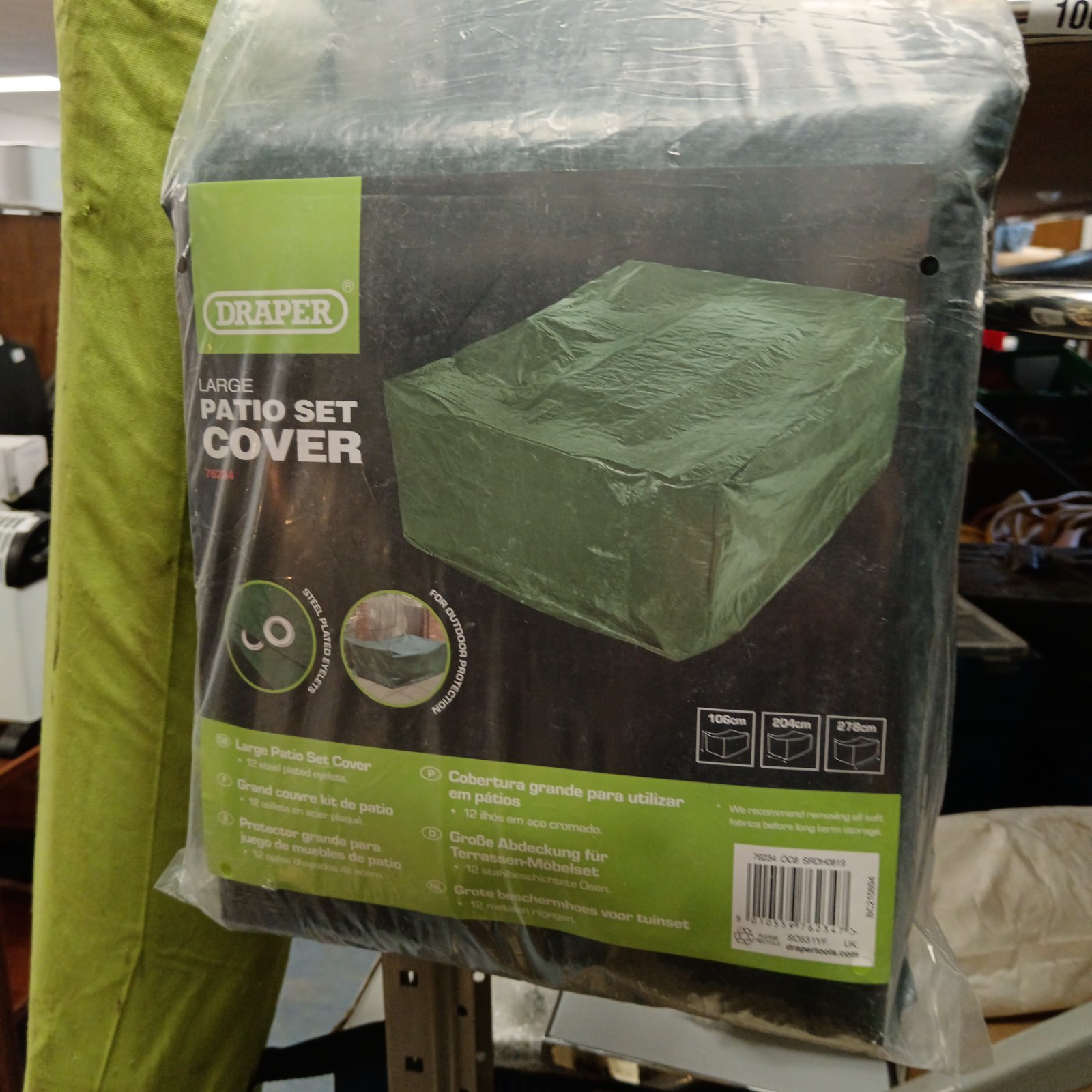 Draper patio cover set in original packaging, ideal for garden furniture.