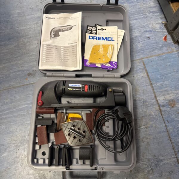 Dremel multi sander kit model 4300 with accessories and manual.
