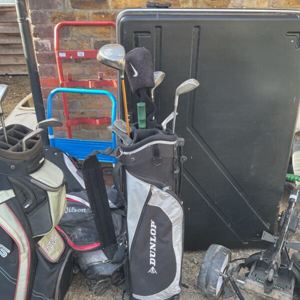 Dunlop golf bag with a set of vintage golf clubs.