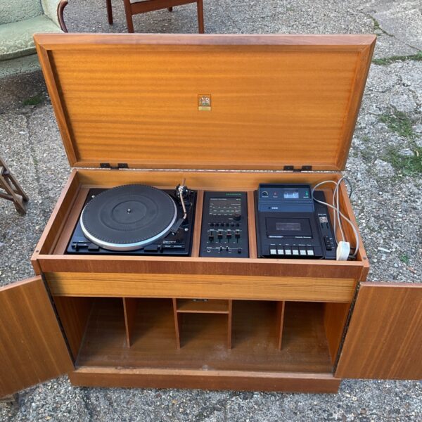Vintage Dynatron hifi system in wood cabinet, front view.