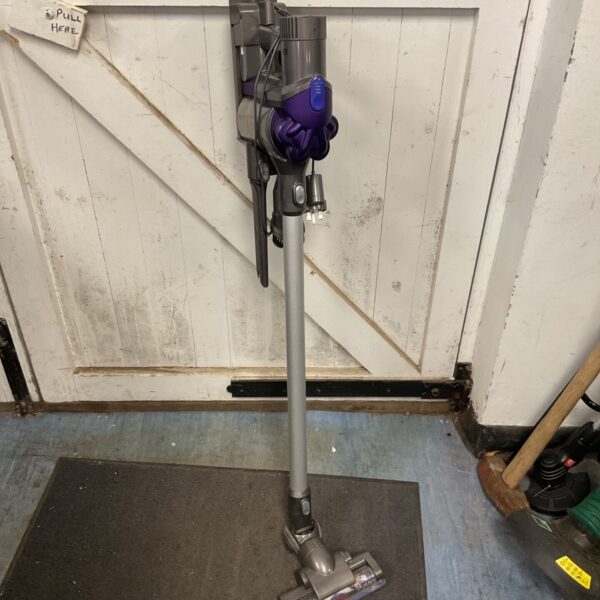 Dyson DC44 Animal cordless vacuum cleaner with charger and accessories.