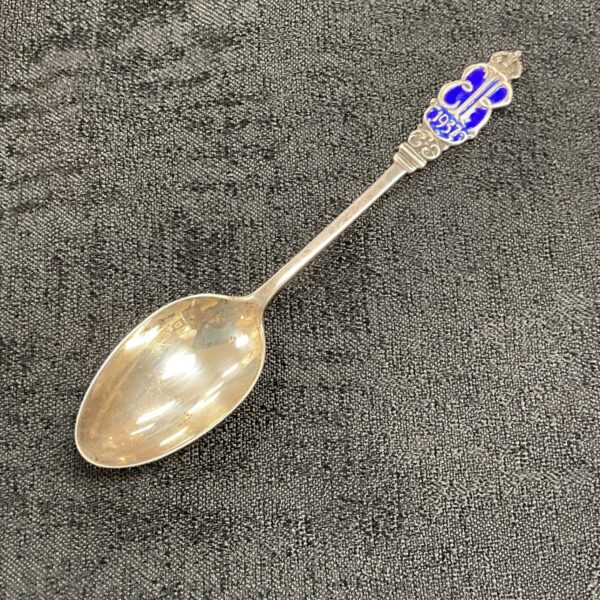 Silver Edward VIII coronation spoon with royal crest.