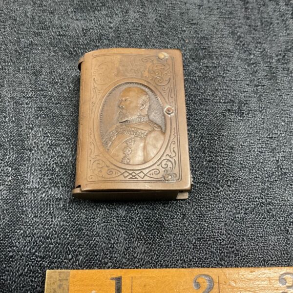 Vintage Bakelite Edward Vll vesta case with portrait detail.