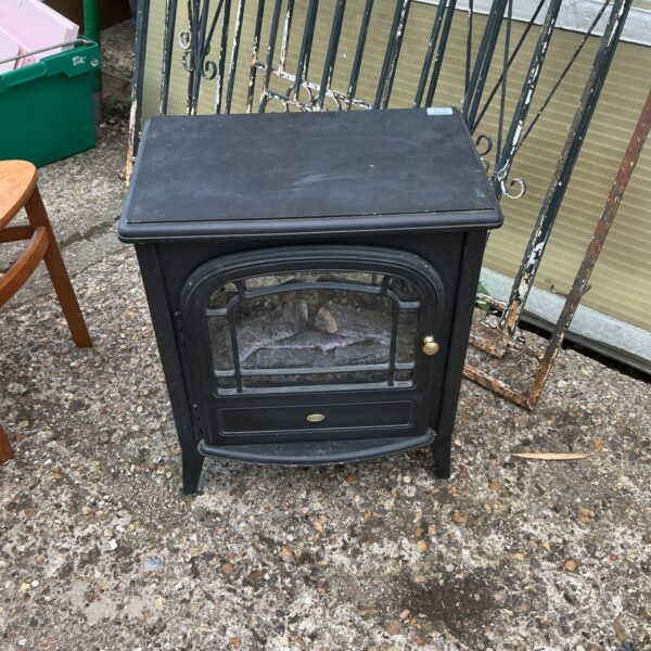 Black electric stove heater with flame effect for home warmth.