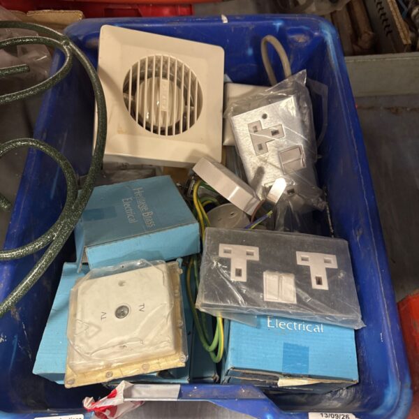 Mixed electrical lot with sockets and an extractor fan for DIY projects.