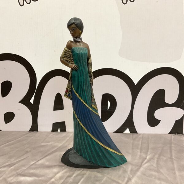 Enesco Princess Mystique figurine in flowing green and gold gown.