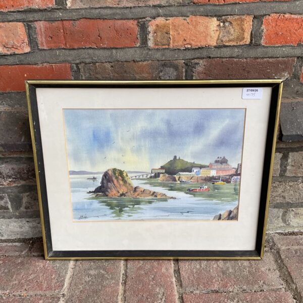 Signed watercolour painting of a tranquil English harbour with boats.