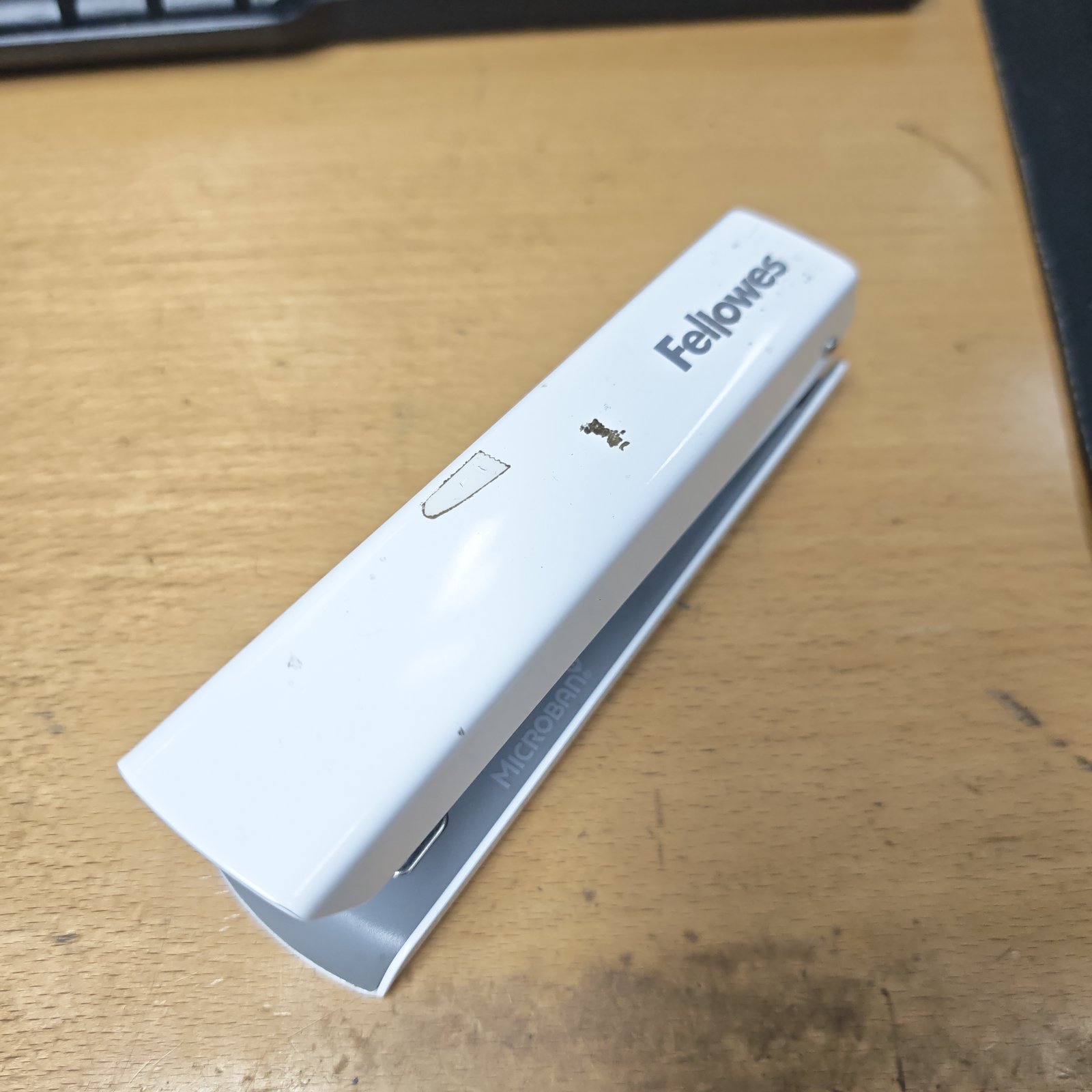 Vintage Fellowes stapler for desk use and office organization.