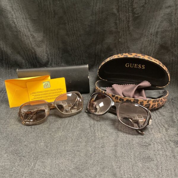 Designer sunglasses lot featuring Fendi and Guess eyewear.