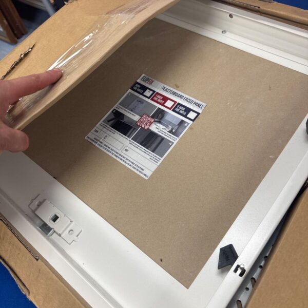 Flipflix plasterboard panel in cardboard packaging, showing fire rating label.