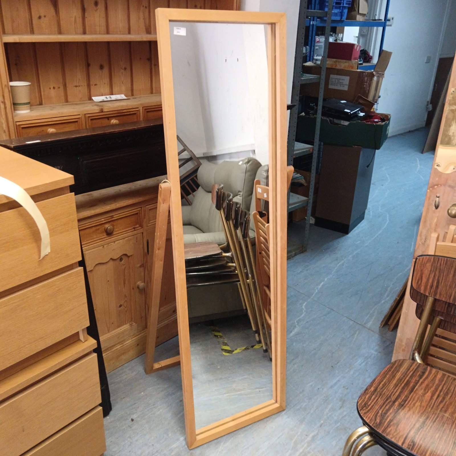 Vintage floor standing mirror with wooden frame.