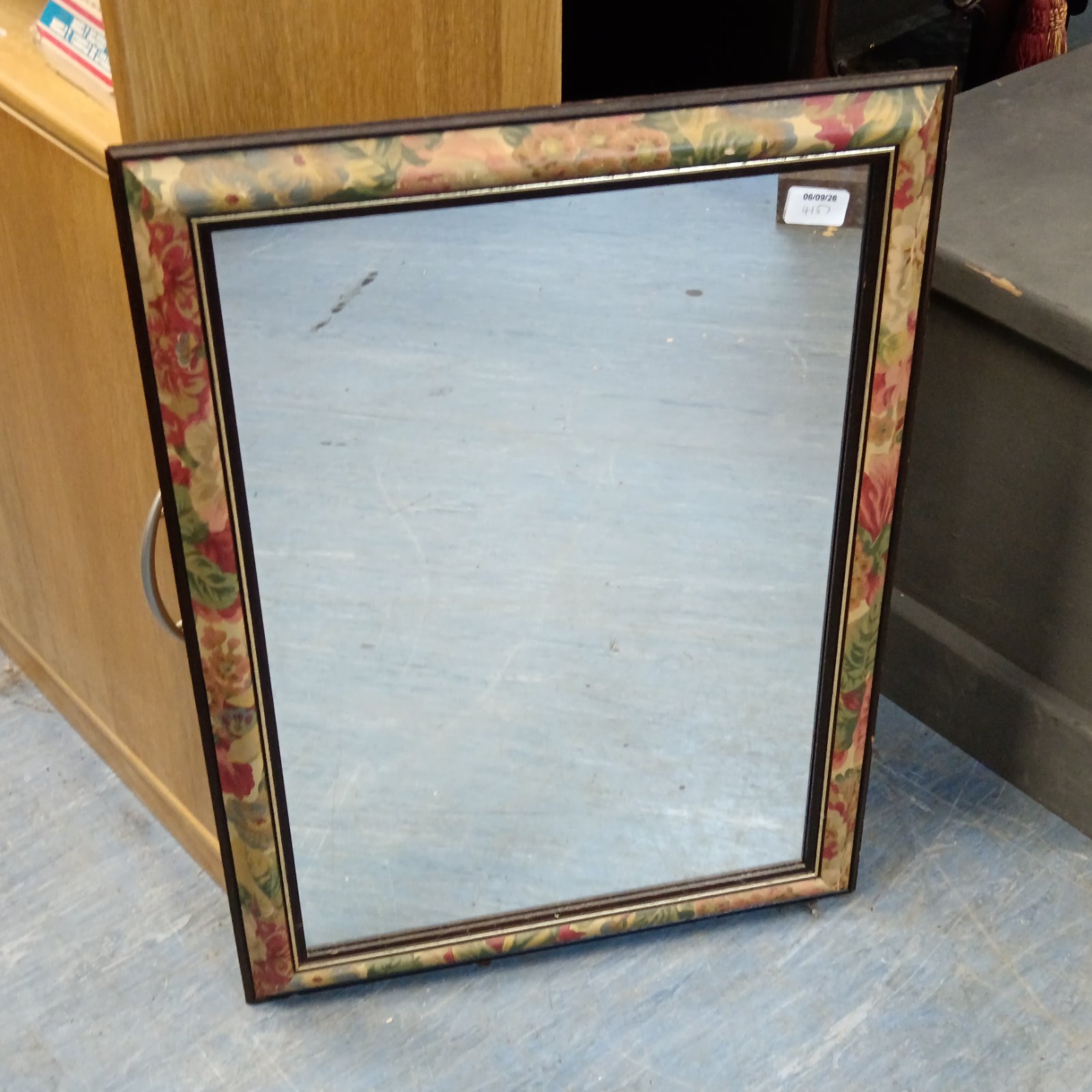 Vintage floral hall mirror measuring 69cm x 49cm.