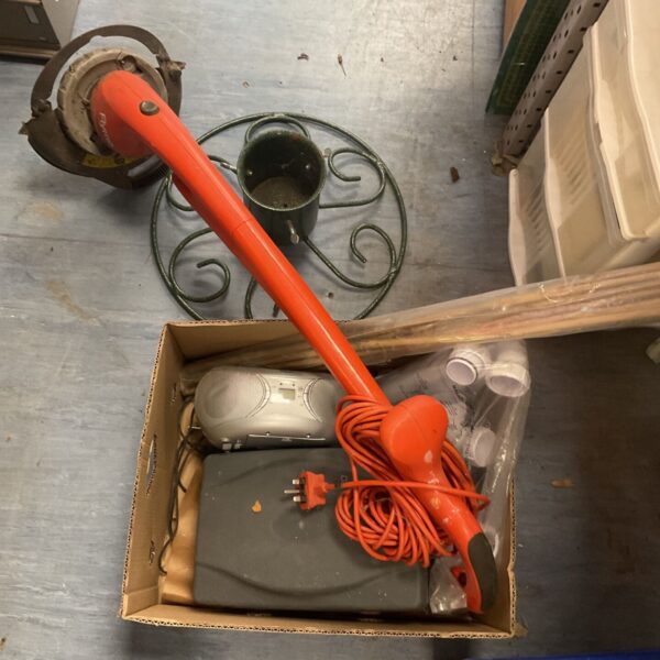 Flymo strimmer with power cable and plumbing pipe in a mixed lot.