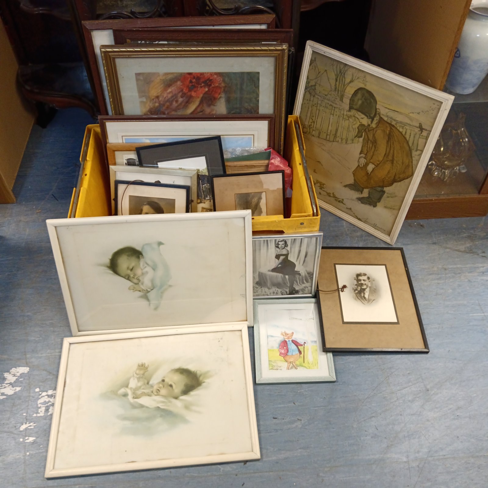 Large collection of framed prints and artwork, vintage wall decor.